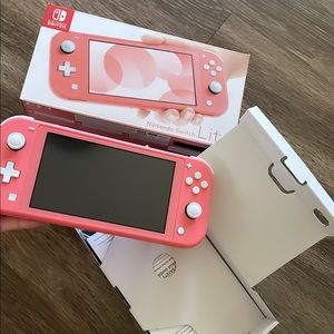 NEW PINK NINTENDO SWITCH LITE